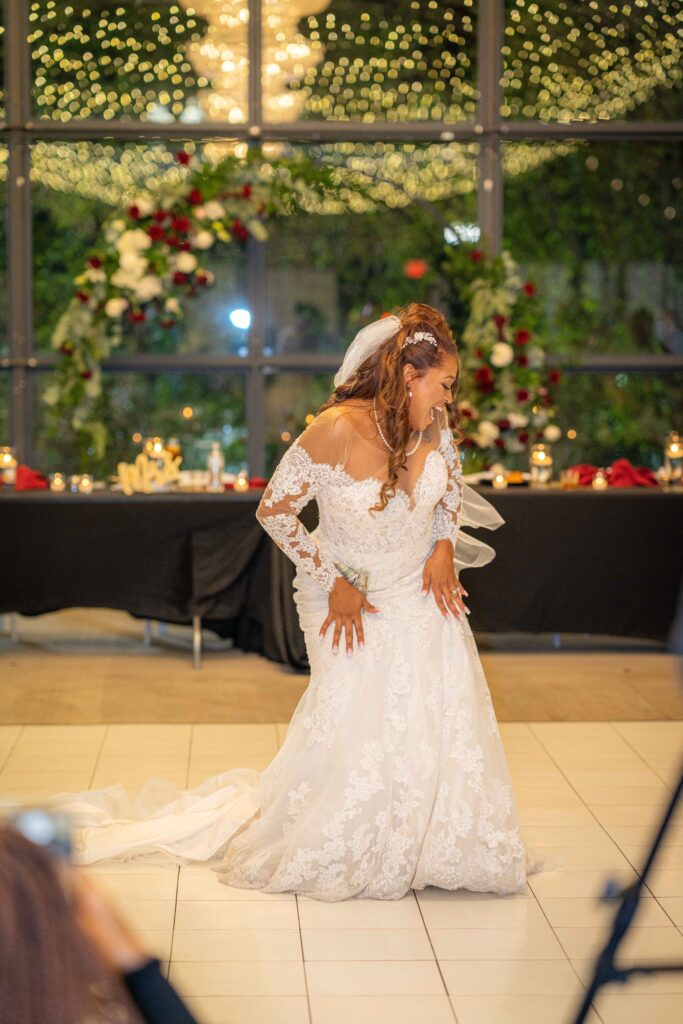 bride on the dance floor at Avent Orangery, a greenhouse wedding venue in Kansas City