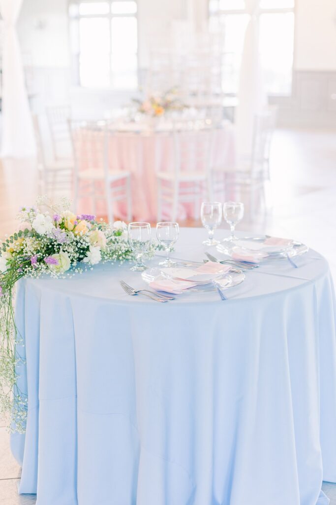 colorful, pastel sweetheart table at 1890 event space