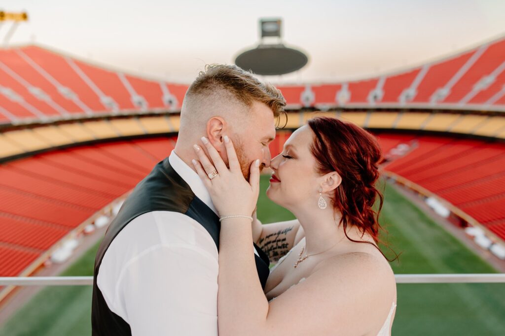 sweet photo of a couple on the drum deck at arrowhead on their wedding day