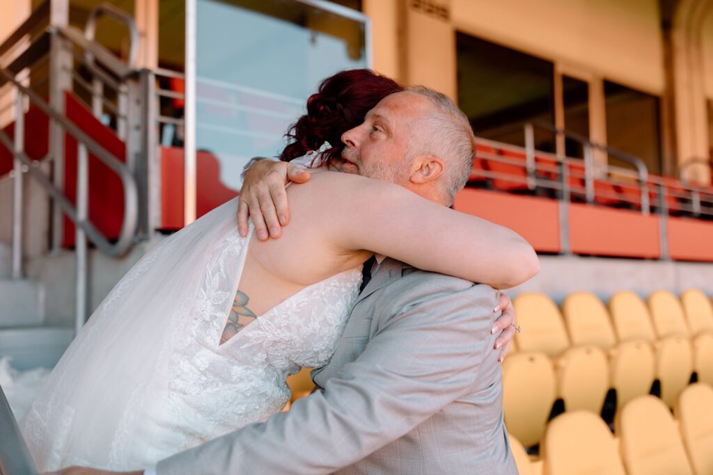 first look with bride and dad at arrowhead stadium