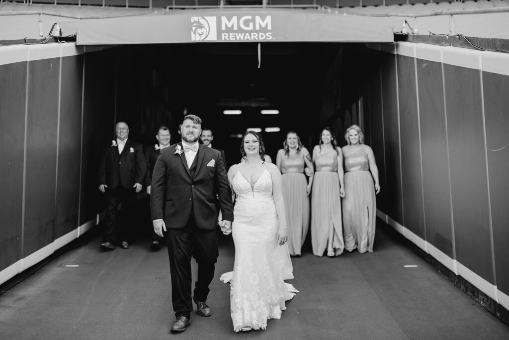 wedding party in the tunnel at arrowhead; black & white