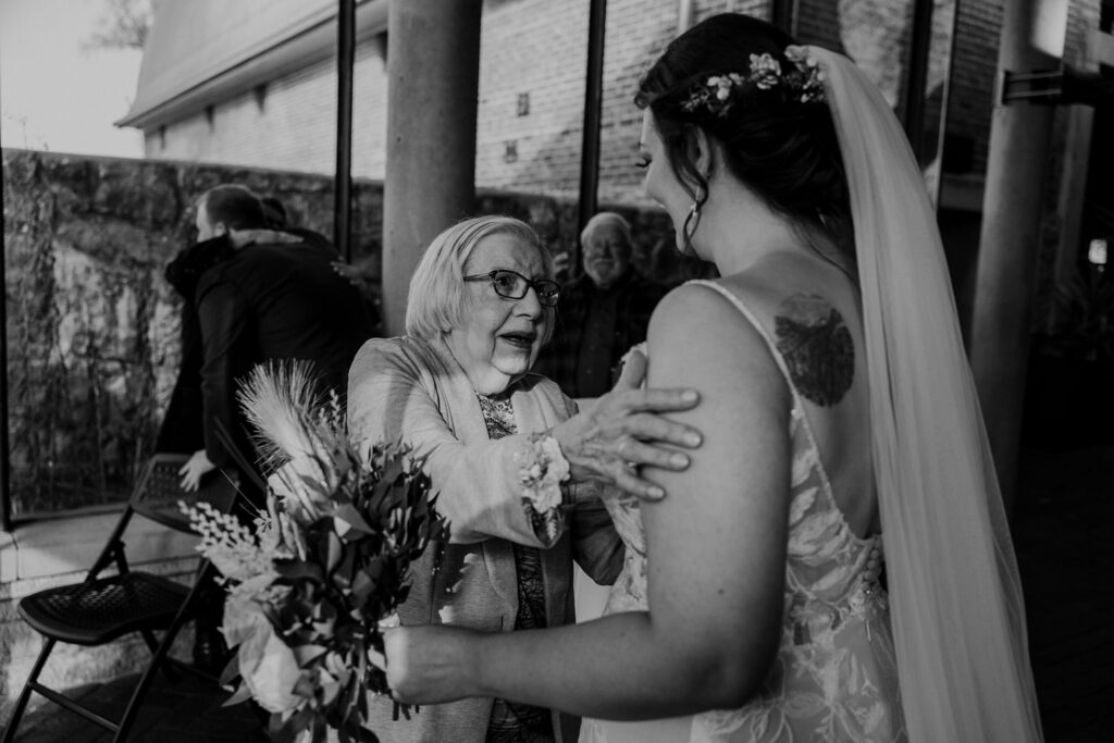 bride seeing grandma at Thompson Barn wedding