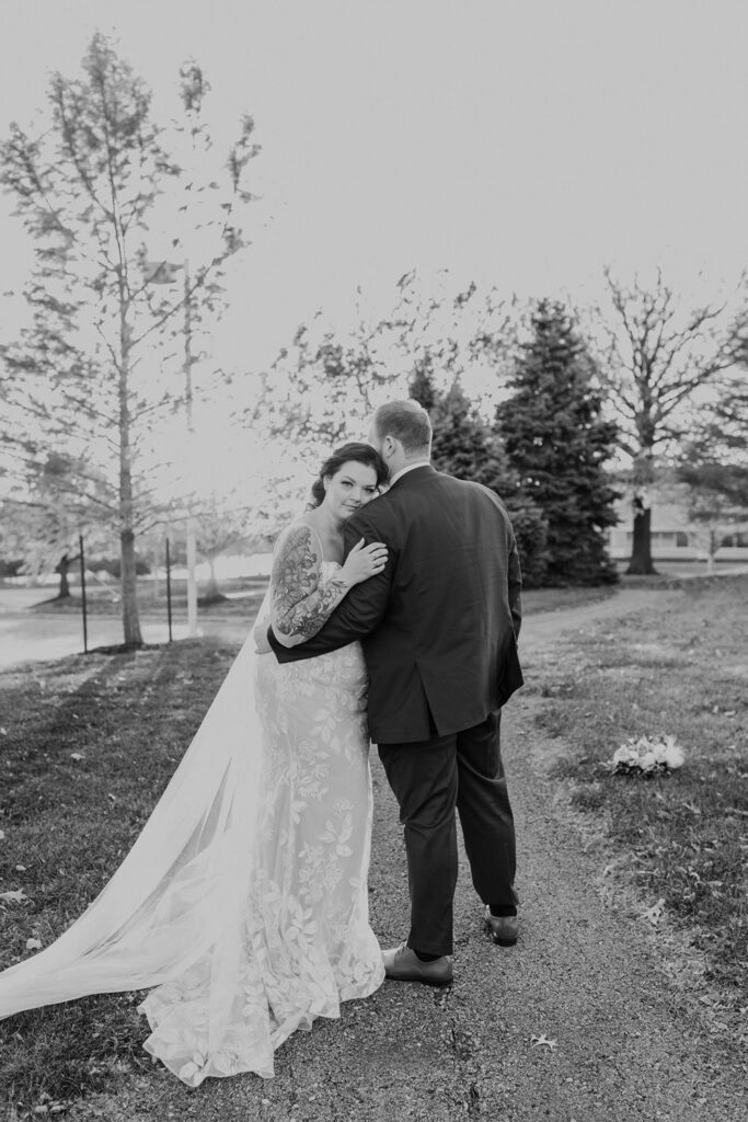 sweet black & white photo of bride & groom at Thompson Barn wedding