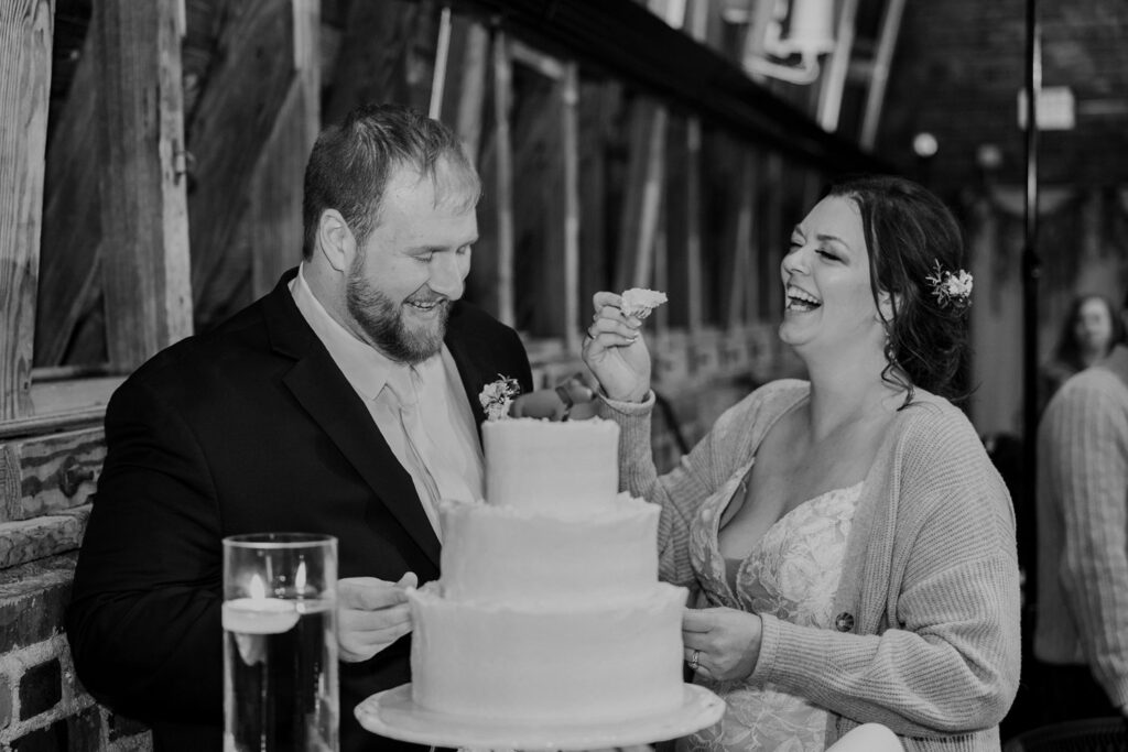 cake cutting at Thompson Barn wedding