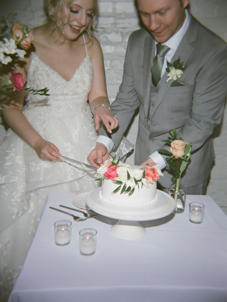 film photography wedding cake cutting