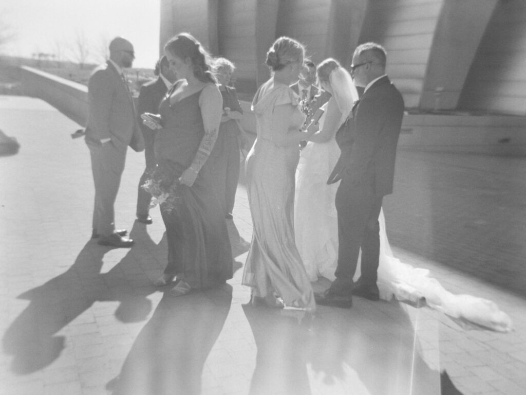 candid film wedding party photo at the Kauffman