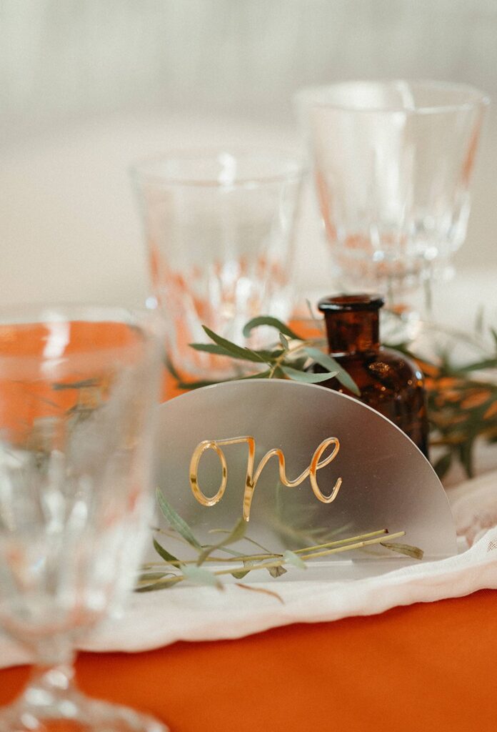 gold and frosted acrylic table number