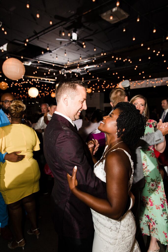 newlyweds on the dance floor at 28 Event Space Kansas City Room wedding