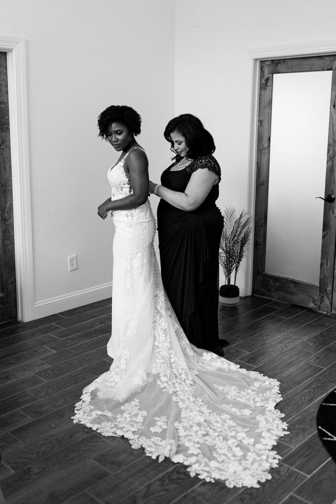 bride getting into dress at 28 Event Space Kansas City