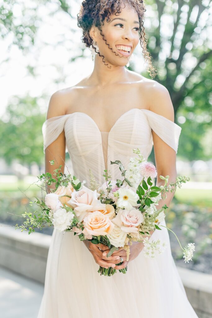 bride with soft, romantic bouquet
