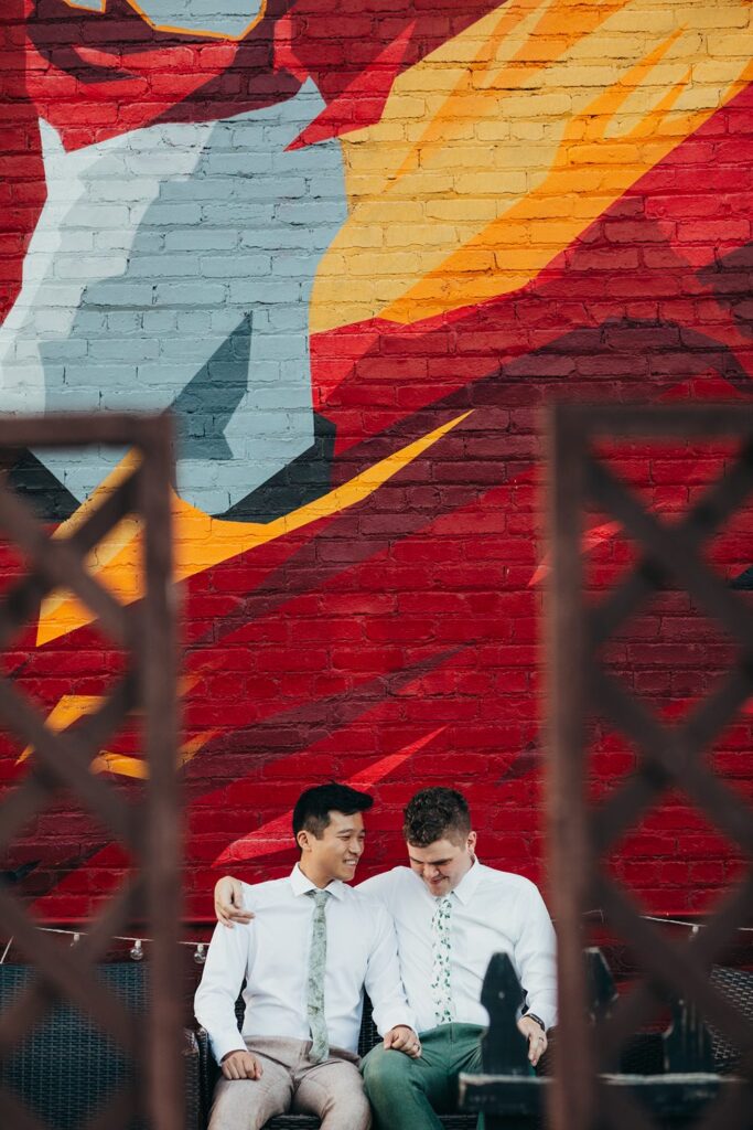 two grooms outside of Tom's Town in Kansas City