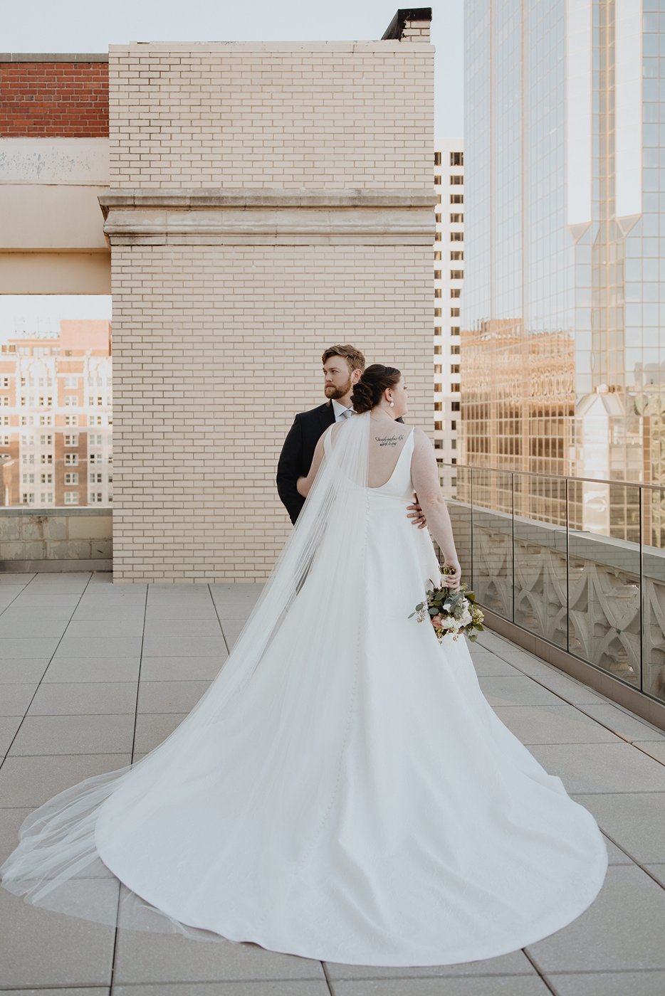 back of wedding gown on Kansas City rooftop