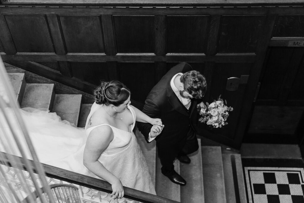 wedding photos on Hotel Kansas City staircase