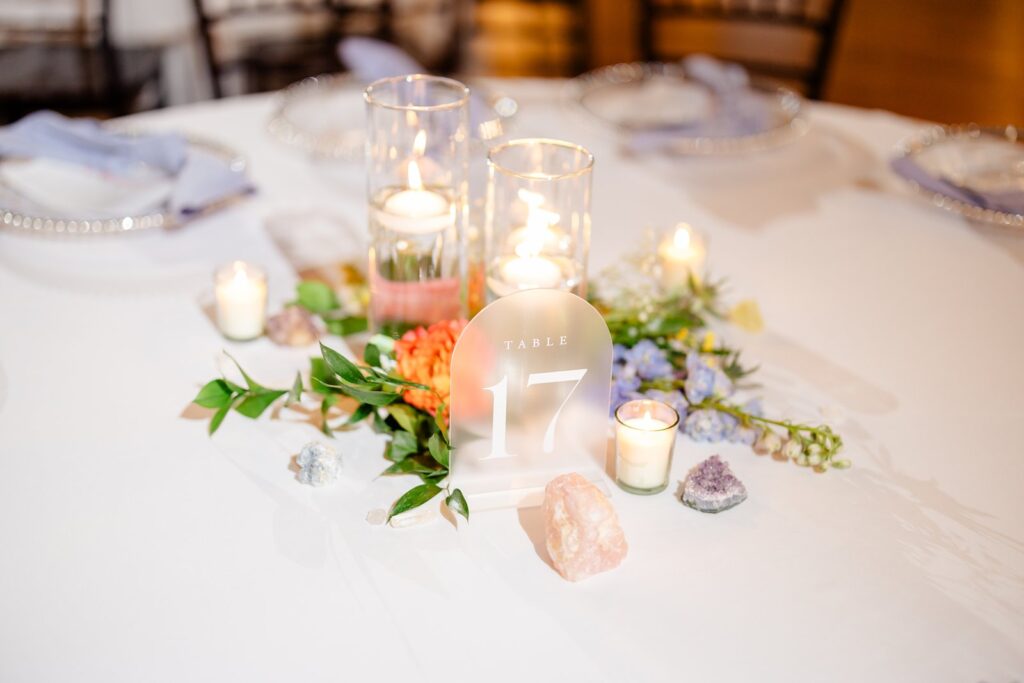 colorful centerpiece at pavilion event space wedding