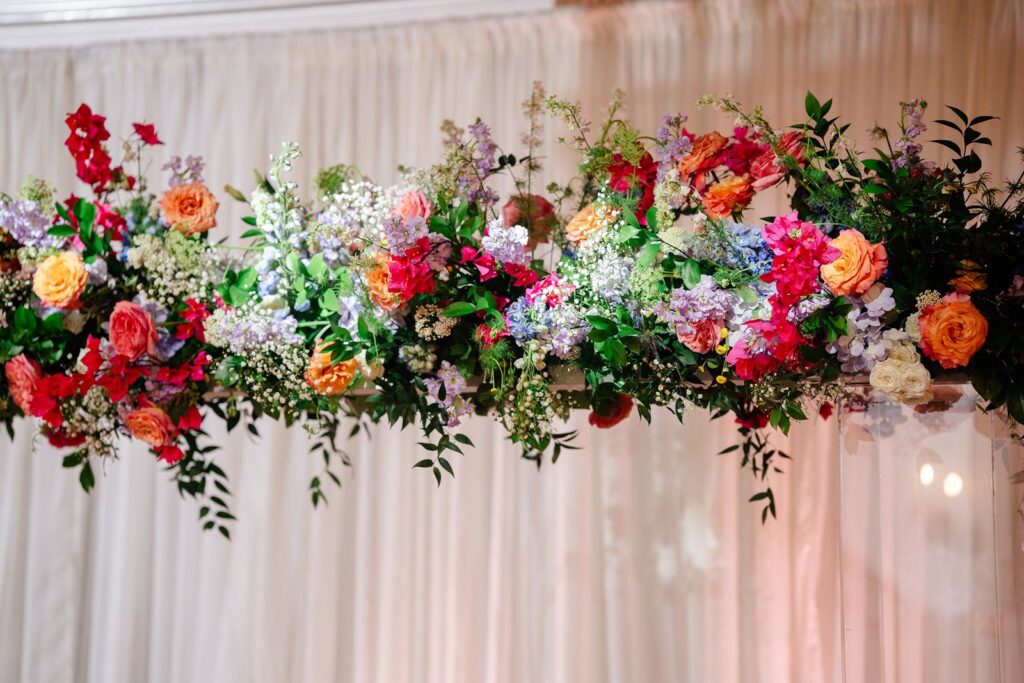 colorful floating floral centerpiece at pavilion event space