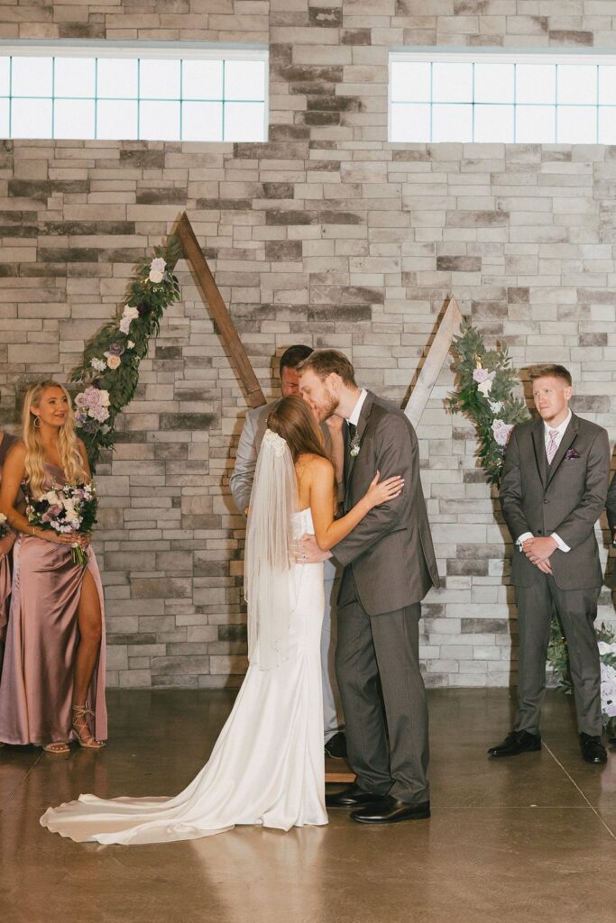 first kiss at The Bell of Camden Point