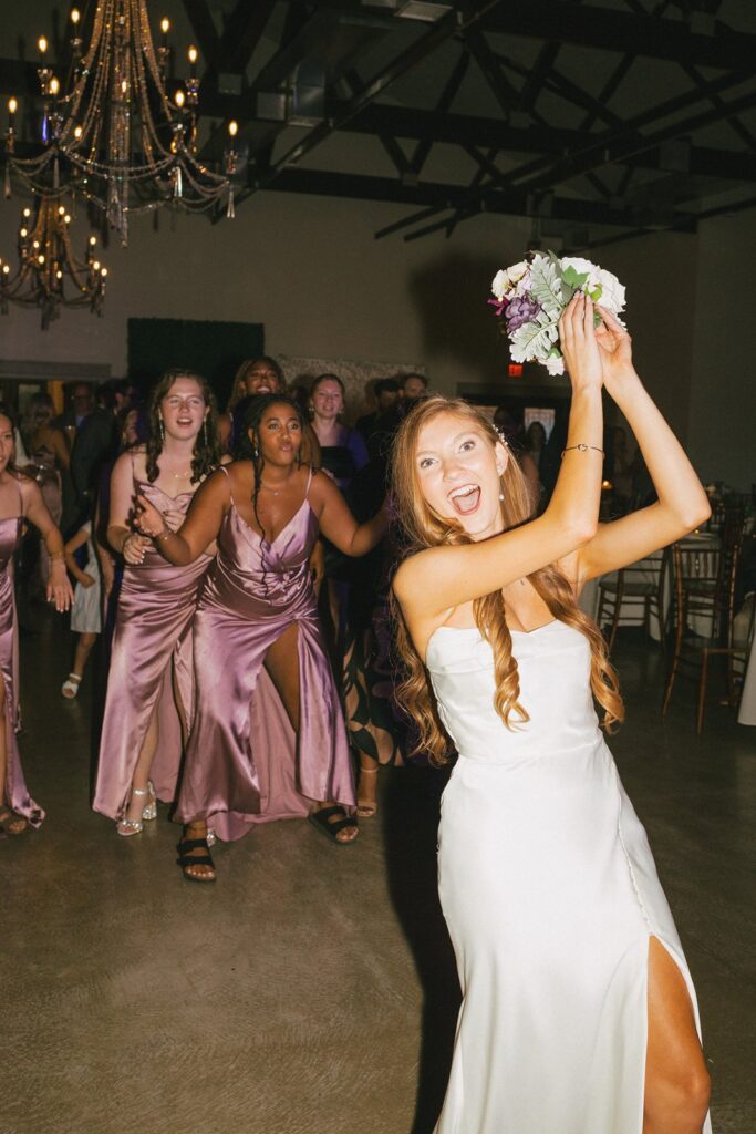 bouquet toss at The Bell of Camden Point