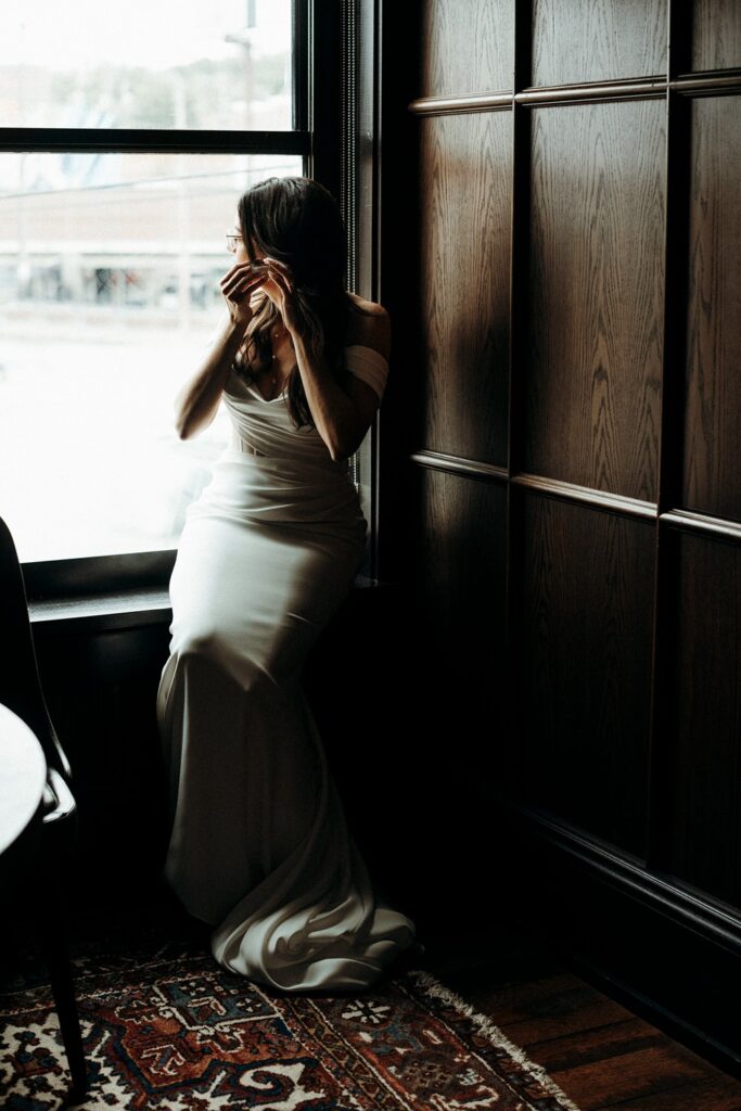 bridal portraits in Crossroads Hotel suite