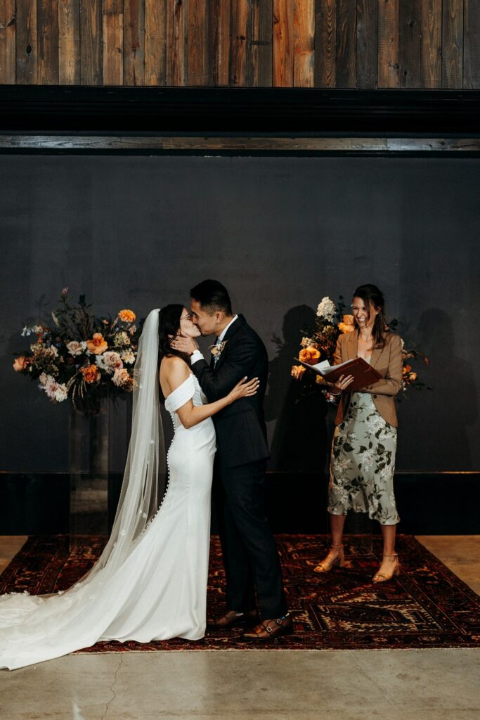 first kiss at Crossroads Hotel wedding