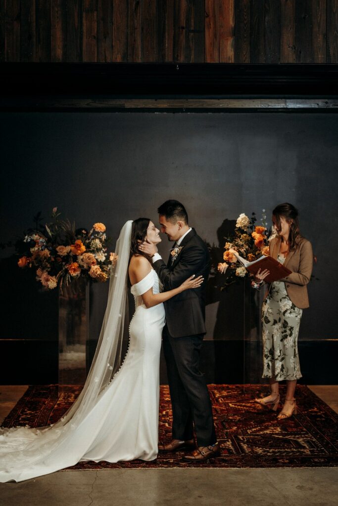 first kiss at Crossroads Hotel wedding