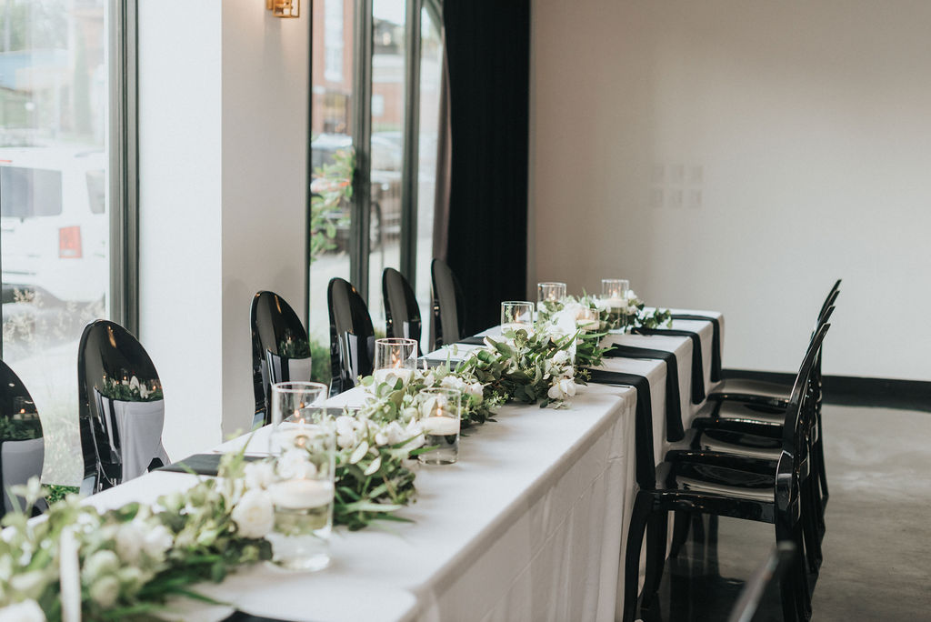 modern Kansas City wedding reception head table at The Maverick