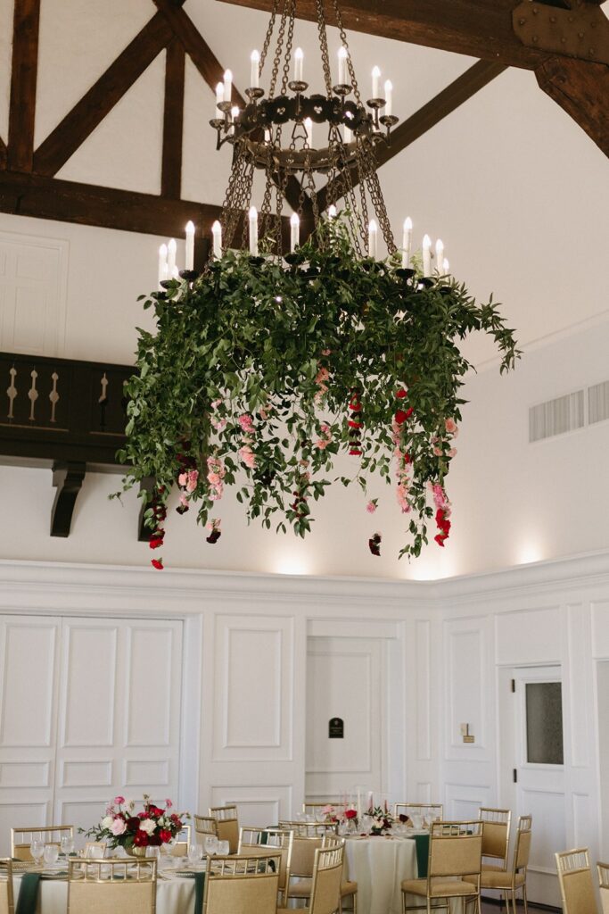 hanging florals from chandelier at Oakwood Country Club