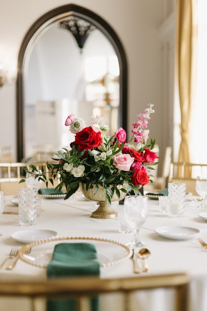 pink and red floral centerpiece at Oakwood Country Club