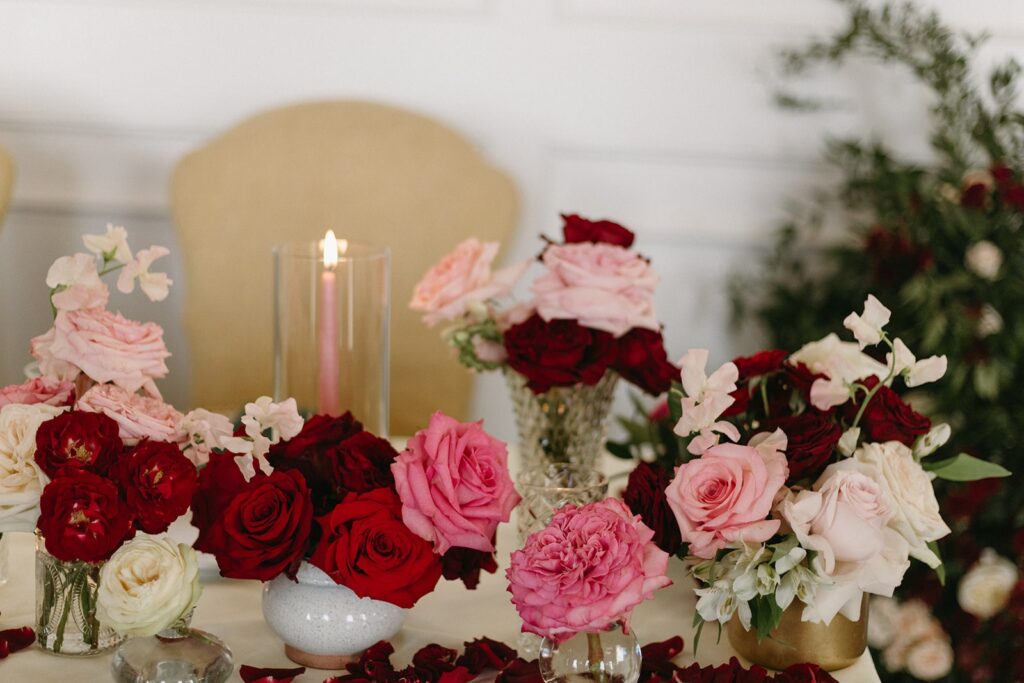 pink and red head table at Oakwood Country Club wedding reception