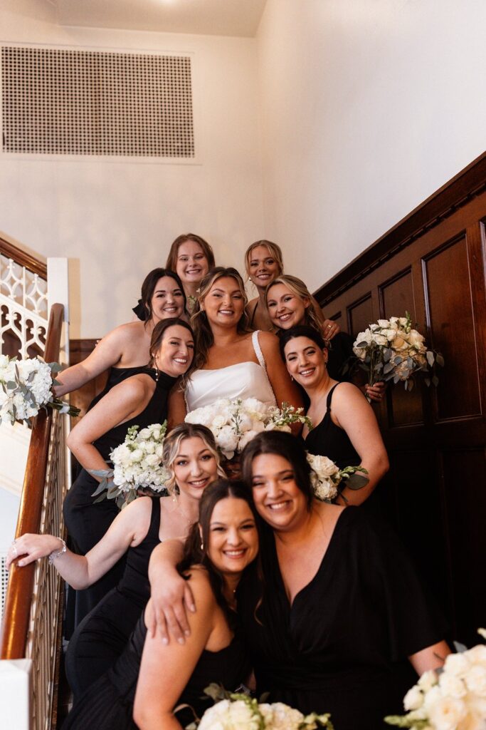 bridesmaids on the stairs at Hotel KC