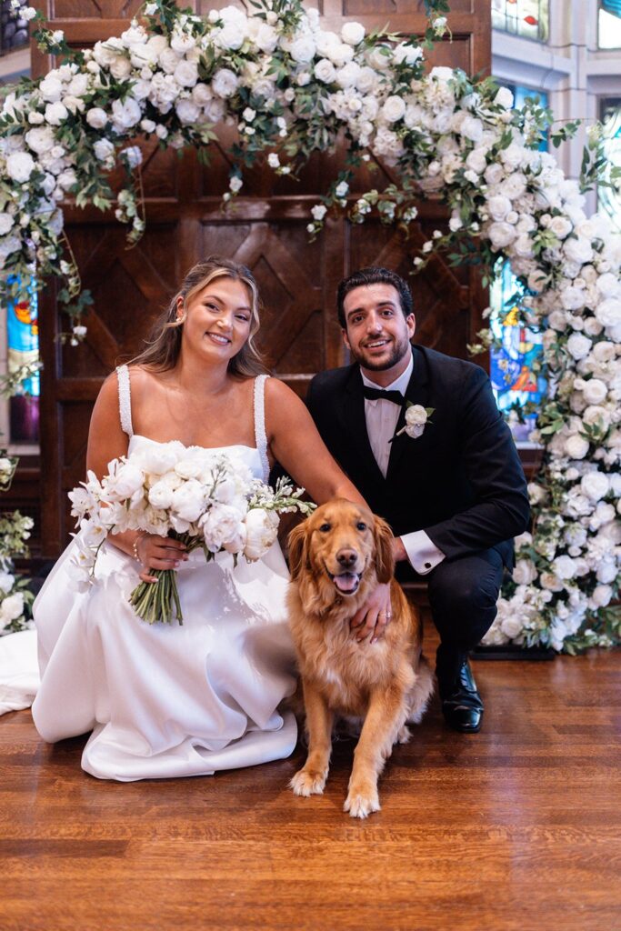 wedding portraits with couple's dog in Tudor ballroom at Hotel KC
