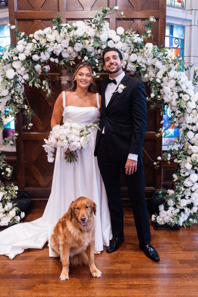 wedding portraits with couple's dog in Tudor ballroom at Hotel KC