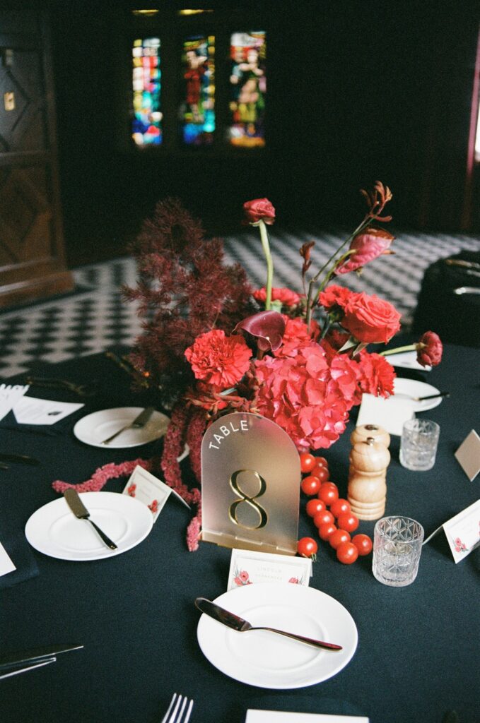 red wedding centerpieces at  Hotel Kansas City's Tudor Ballroom