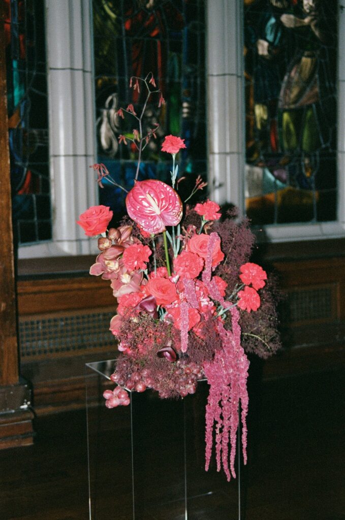 all red floral Anthurium  and Amaryllis arrangement wedding ceremony Hotel Kansas City's Tudor Ballroom