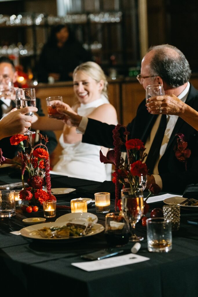 toasts and speeches in the Tudor Ballroom at Hotel Kansas City wedding