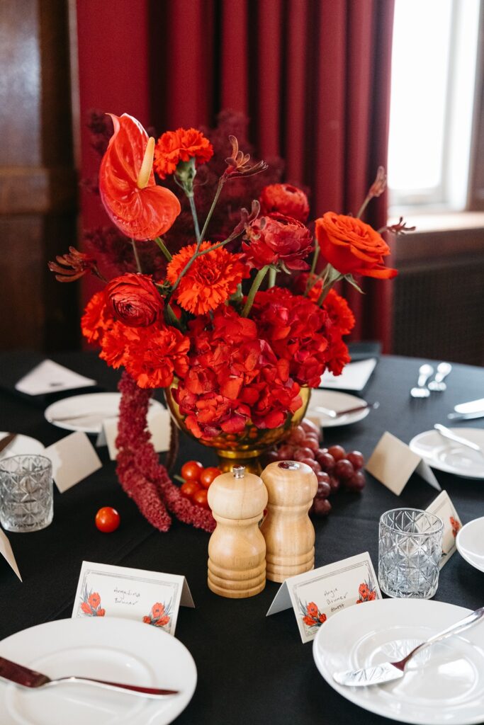 red wedding centerpieces at  Hotel Kansas City's Tudor Ballroom