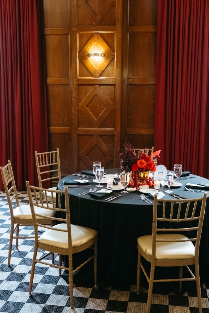 Hotel Kansas City wedding reception - all-red floral and fruit centerpieces