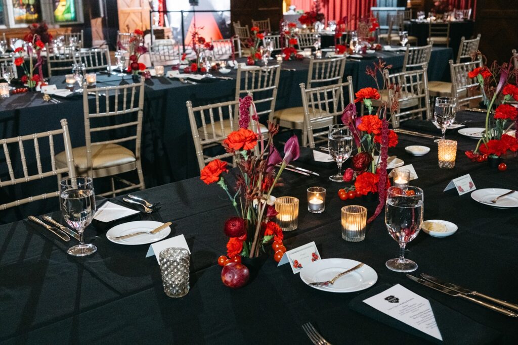 Hotel Kansas City wedding reception - all-red floral and fruit centerpieces
