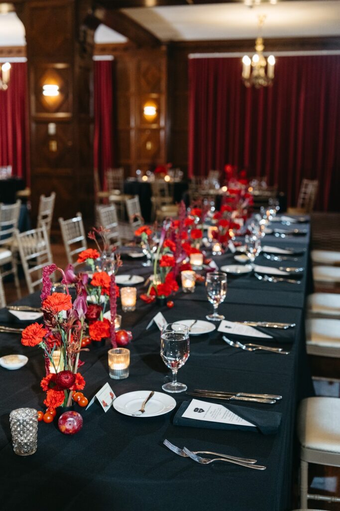red wedding centerpieces at  Hotel Kansas City's Tudor Ballroom