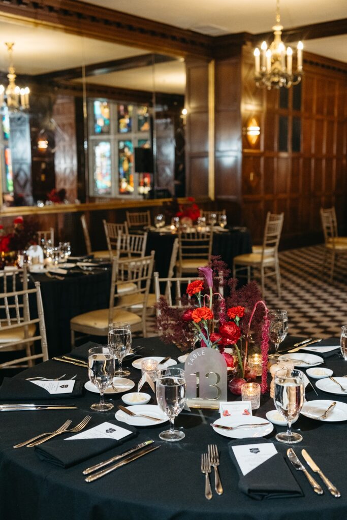 red wedding centerpieces at  Hotel Kansas City's Tudor Ballroom