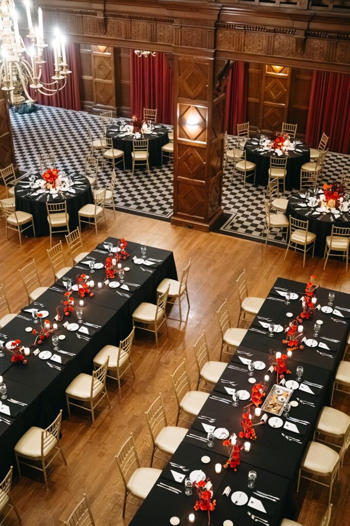 Hotel Kansas City wedding reception - all-red floral and fruit centerpieces