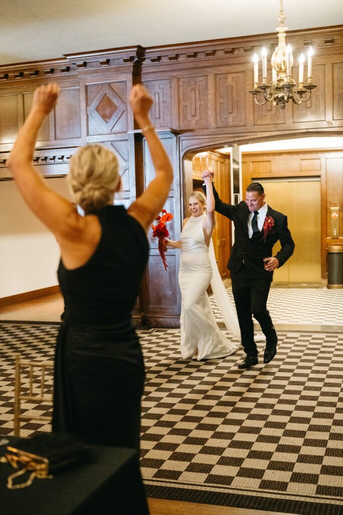 newlywed grand entrance into the Tudor Ballroom at Hotel Kansas City