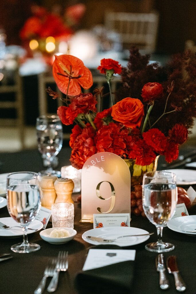 red anthurium moody wedding centerpiece