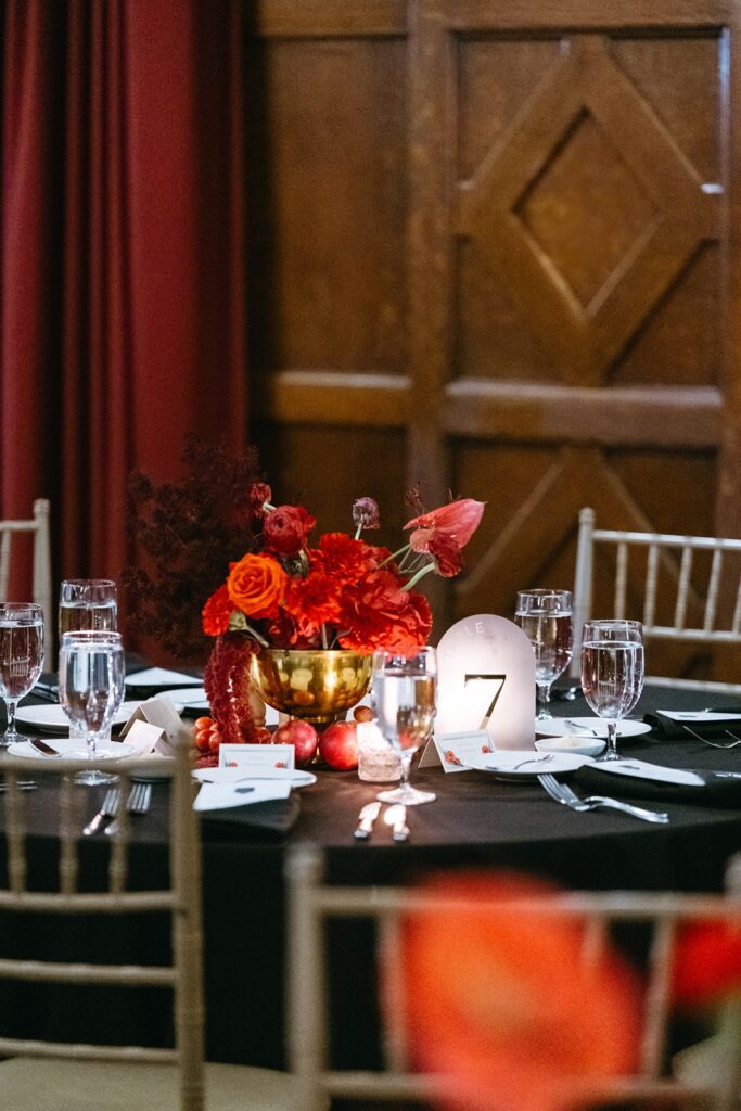 red wedding centerpieces at  Hotel Kansas City's Tudor Ballroom