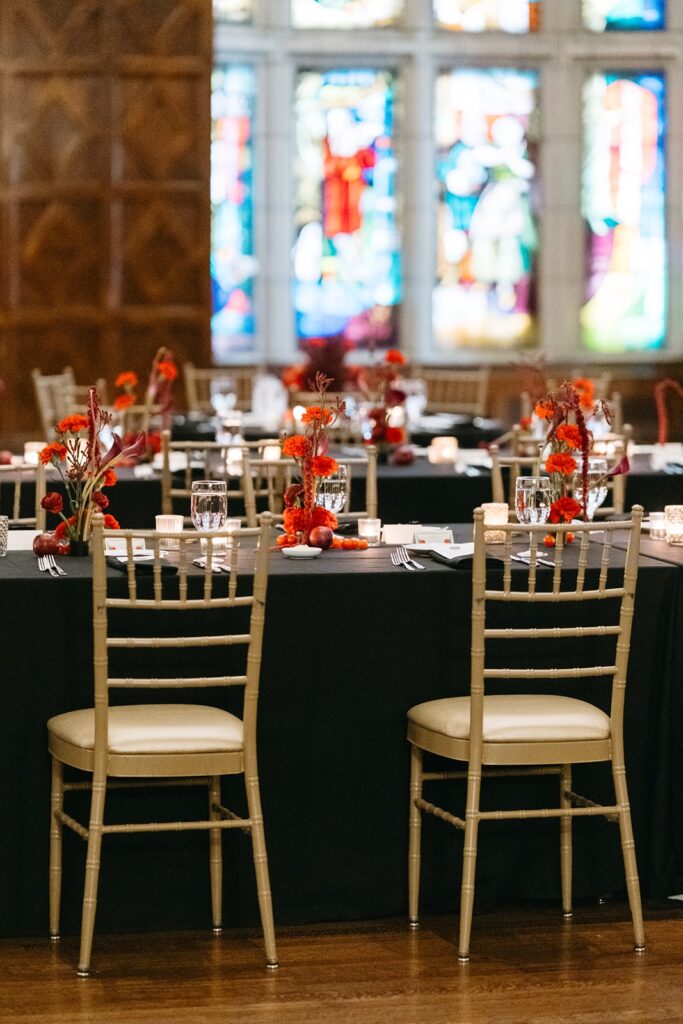 red wedding centerpieces at  Hotel Kansas City's Tudor Ballroom