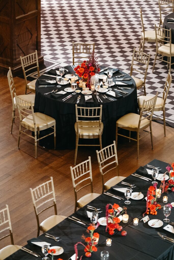 Hotel Kansas City wedding reception - all-red floral and fruit centerpieces
