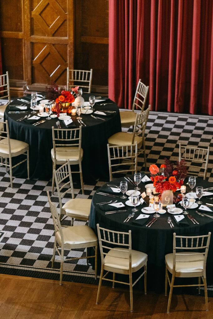 Hotel Kansas City wedding reception - all-red floral and fruit centerpieces