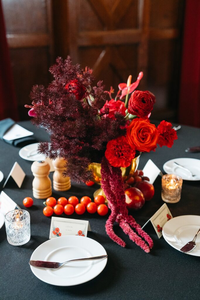 red wedding centerpieces at  Hotel Kansas City's Tudor Ballroom