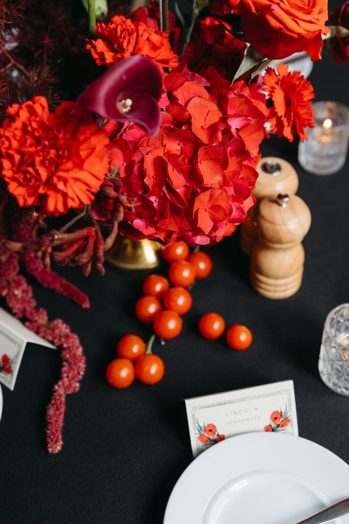 red wedding centerpieces at  Hotel Kansas City's Tudor Ballroom