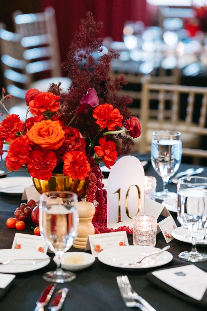 red wedding centerpieces at  Hotel Kansas City's Tudor Ballroom
