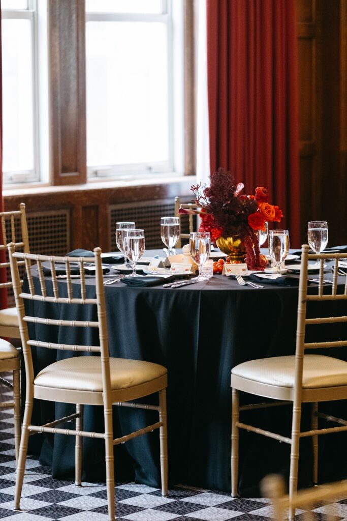 red wedding centerpieces at  Hotel Kansas City's Tudor Ballroom
